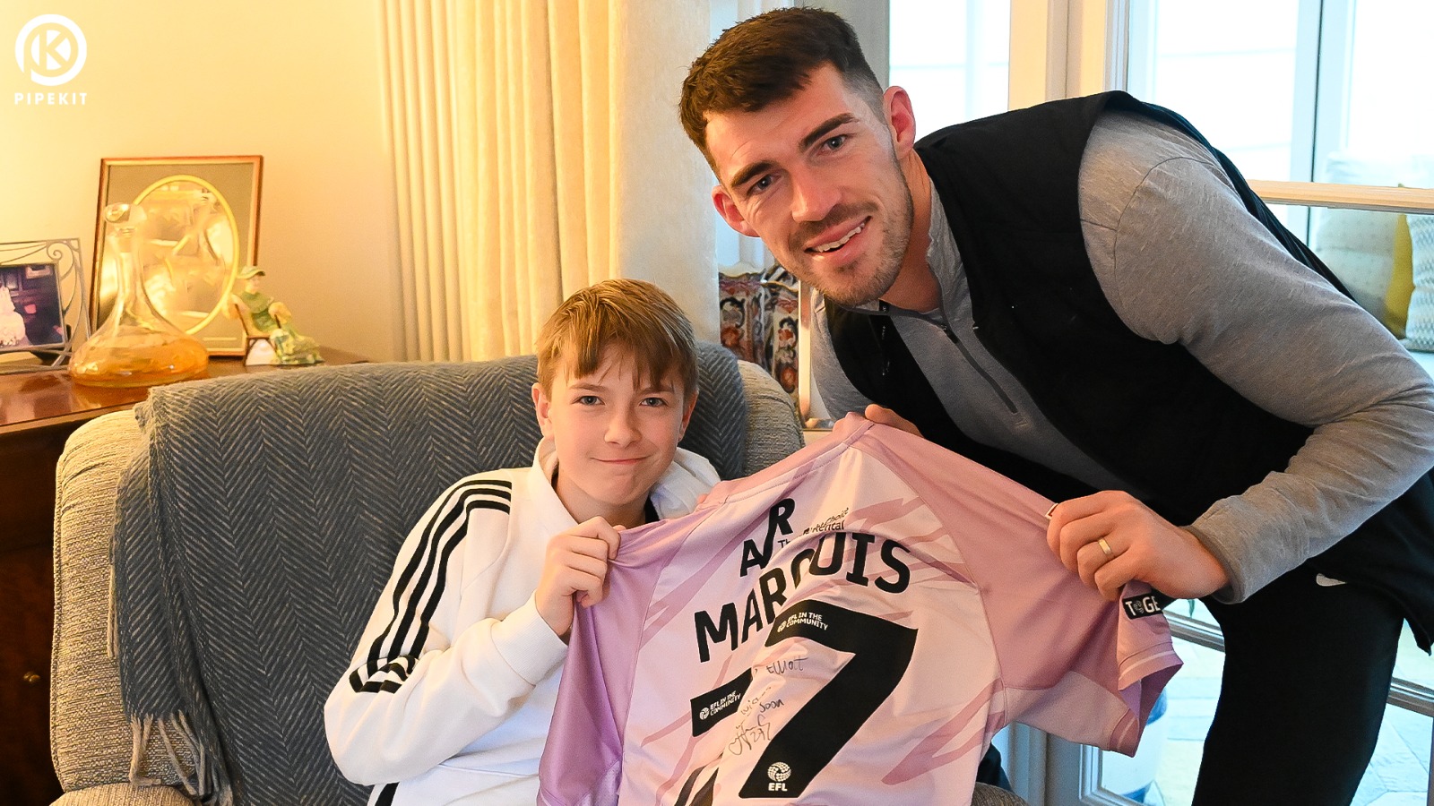 John Marquis visits injured Town fan Elliott after road incident